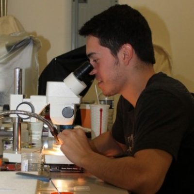 Jed Sharrard keying out macroinvertebrates